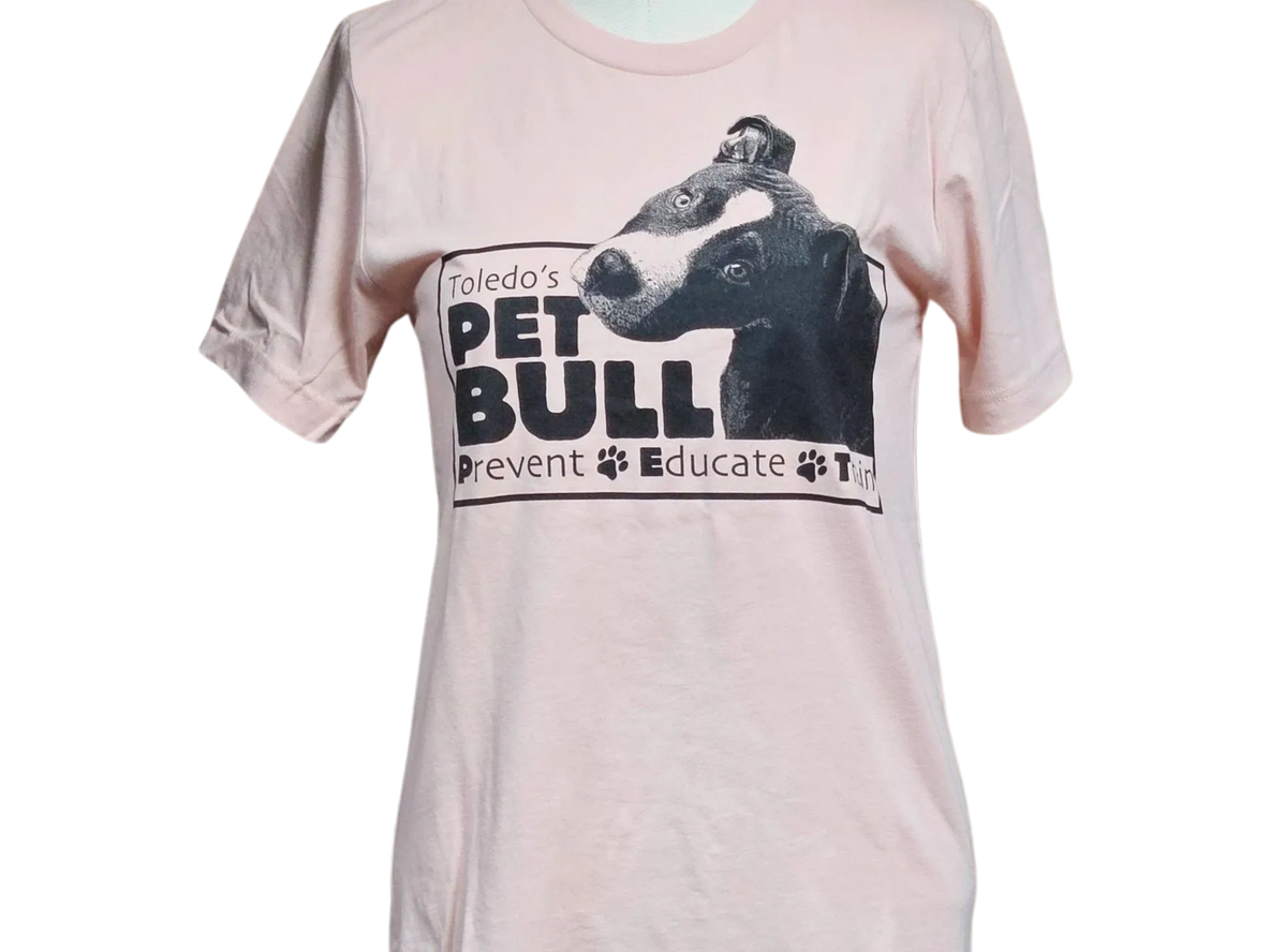 A pink shirt with a picture of a dog.