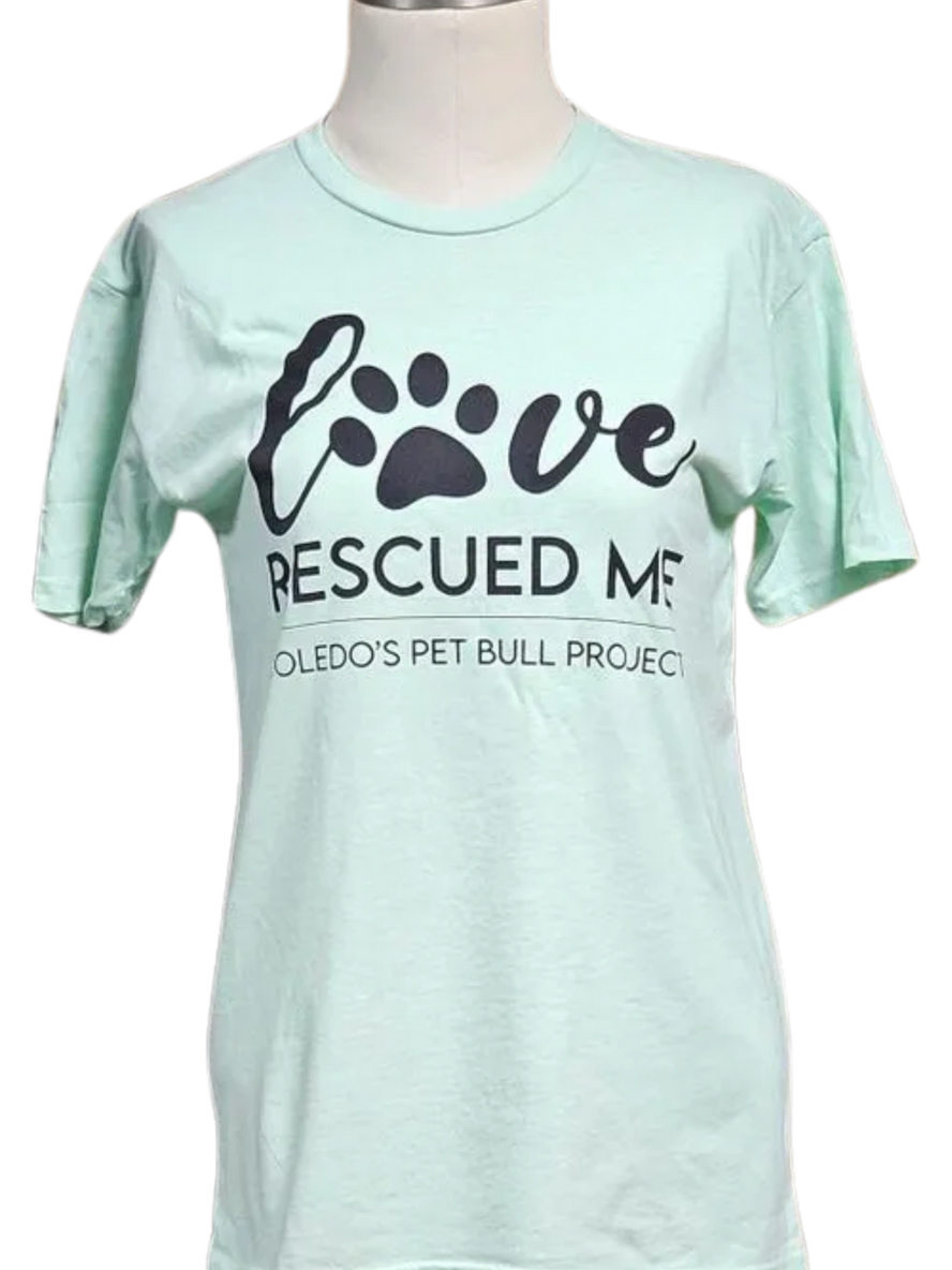 A t-shirt that says love rescued me.