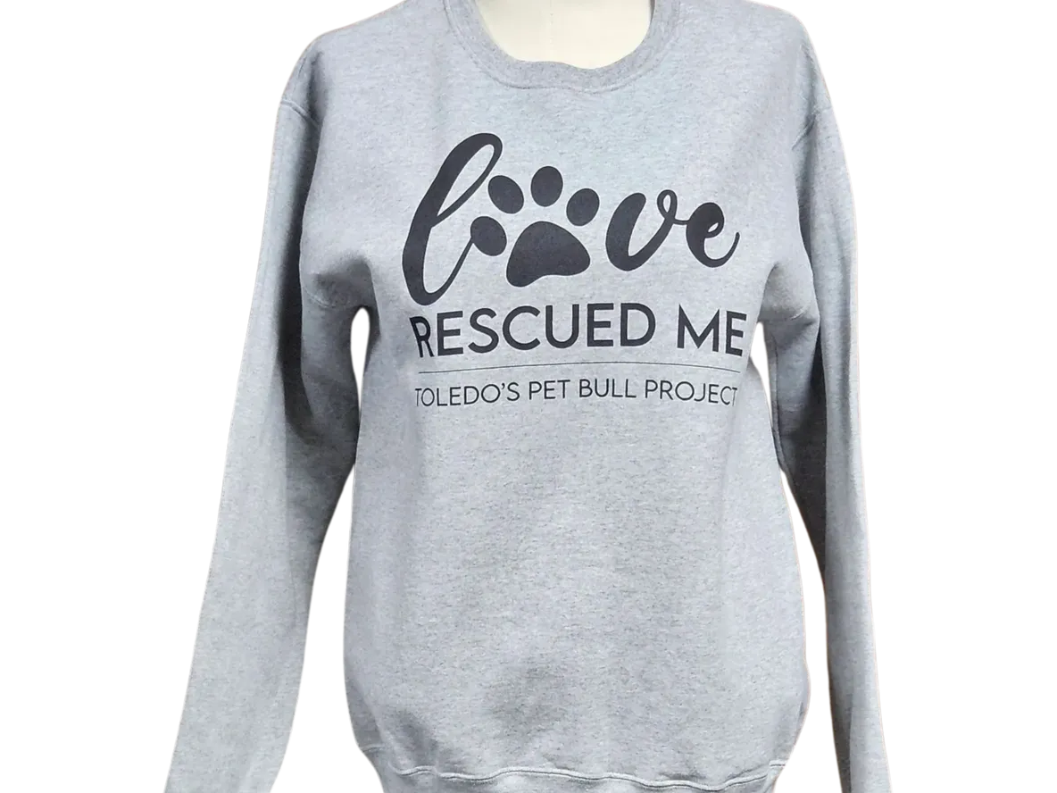 A gray sweatshirt with the words " love rescued me ".
