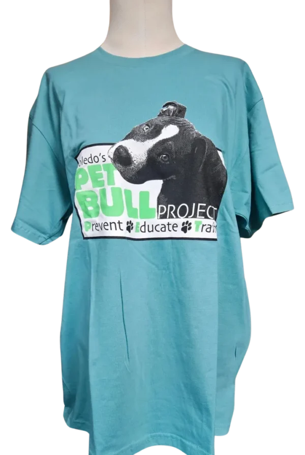 A blue shirt with a picture of a dog.