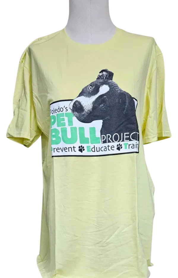 A yellow shirt with a picture of a dog.
